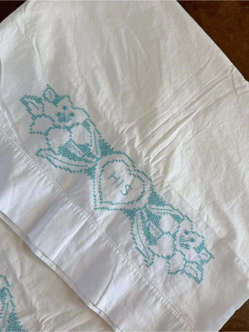 Embroidered White Linen Pillowcases with Aqua Floral Monogram